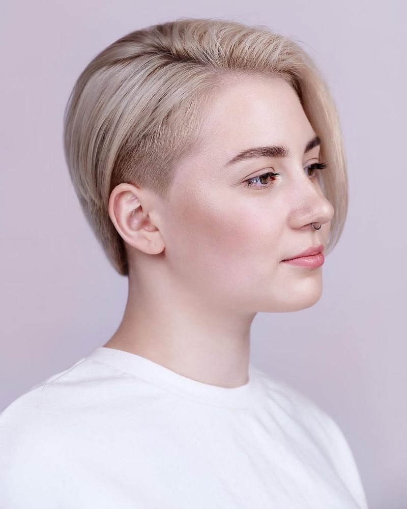 26. Asymmetrical Undercut Blonde Pixie