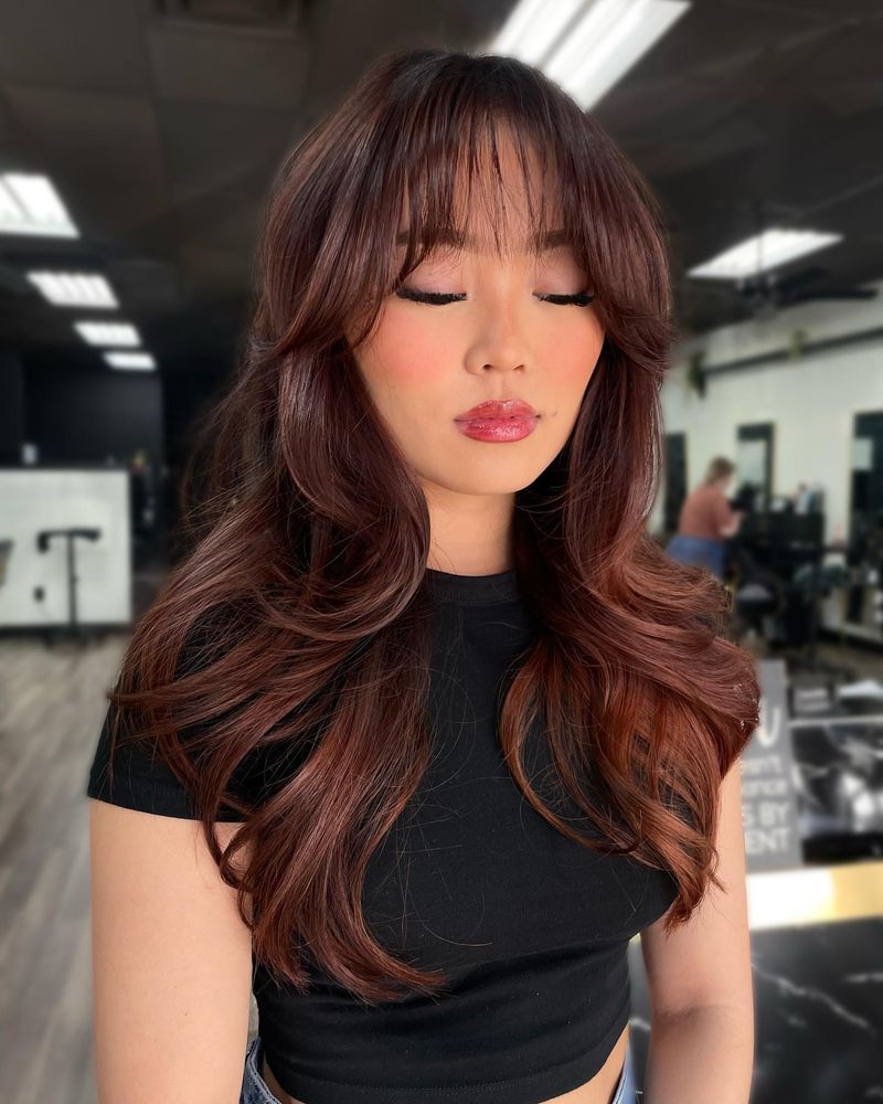 45. Auburn Blowout Layers with Wispy Fringe