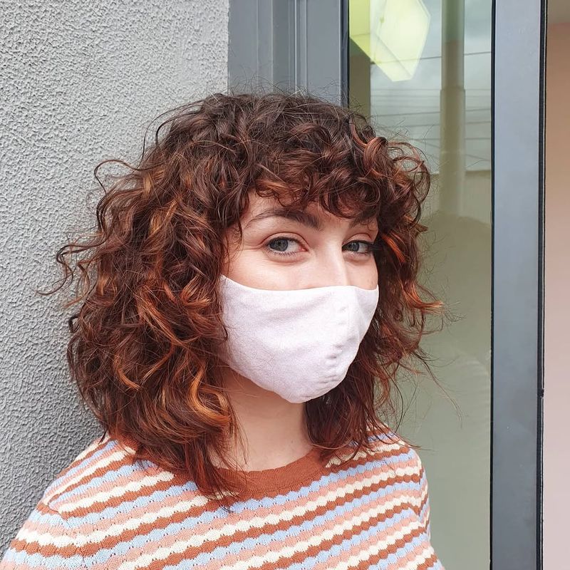44. Auburn Curls with Curly Fringe