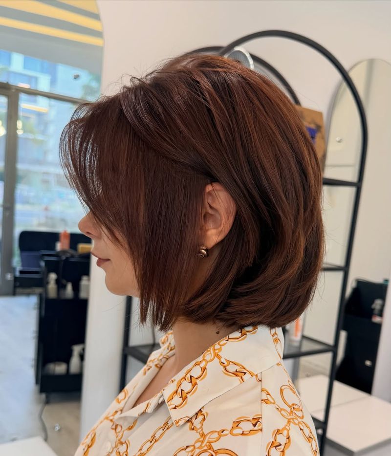 32. Auburn Layered Bob with Curtained Fringe