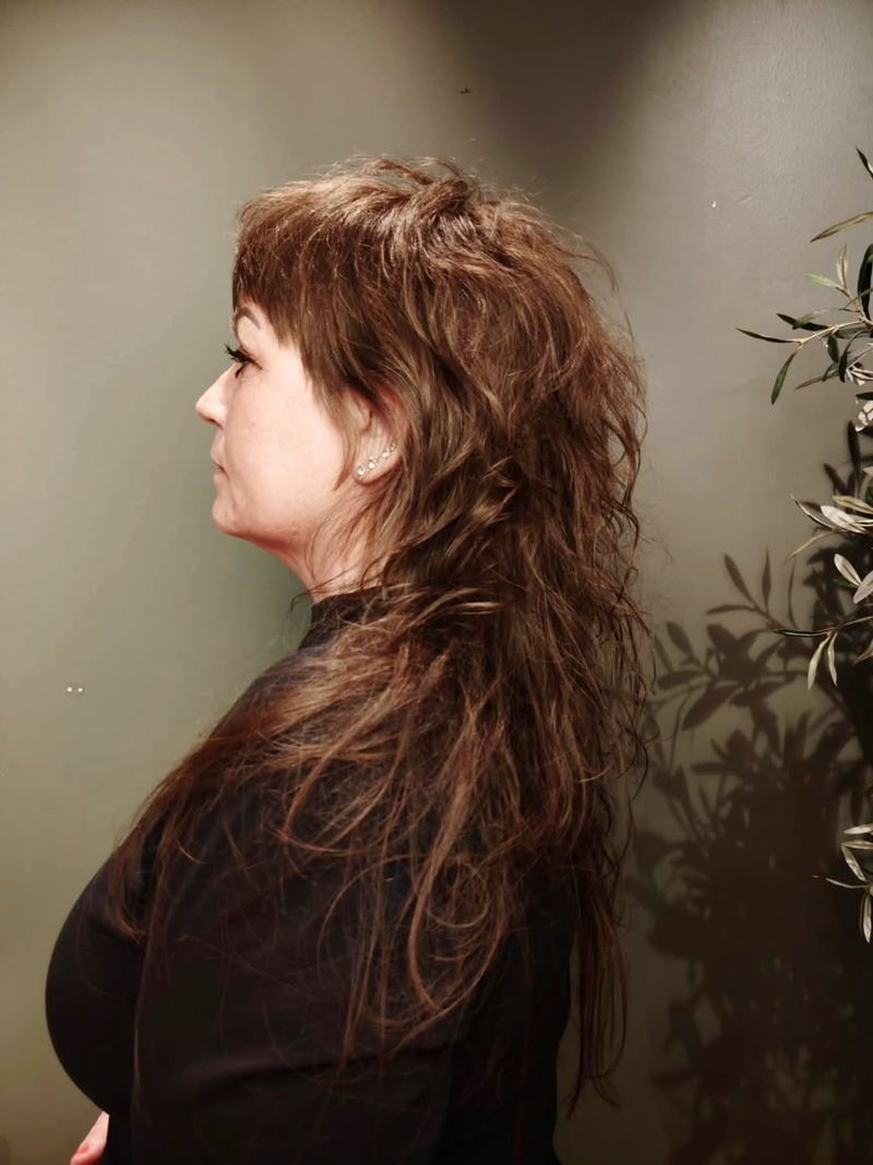 15. Auburn Rocker Shag with Heavy Bangs