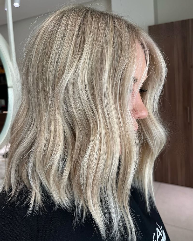 27. Beige Blonde Lob with Soft Waves