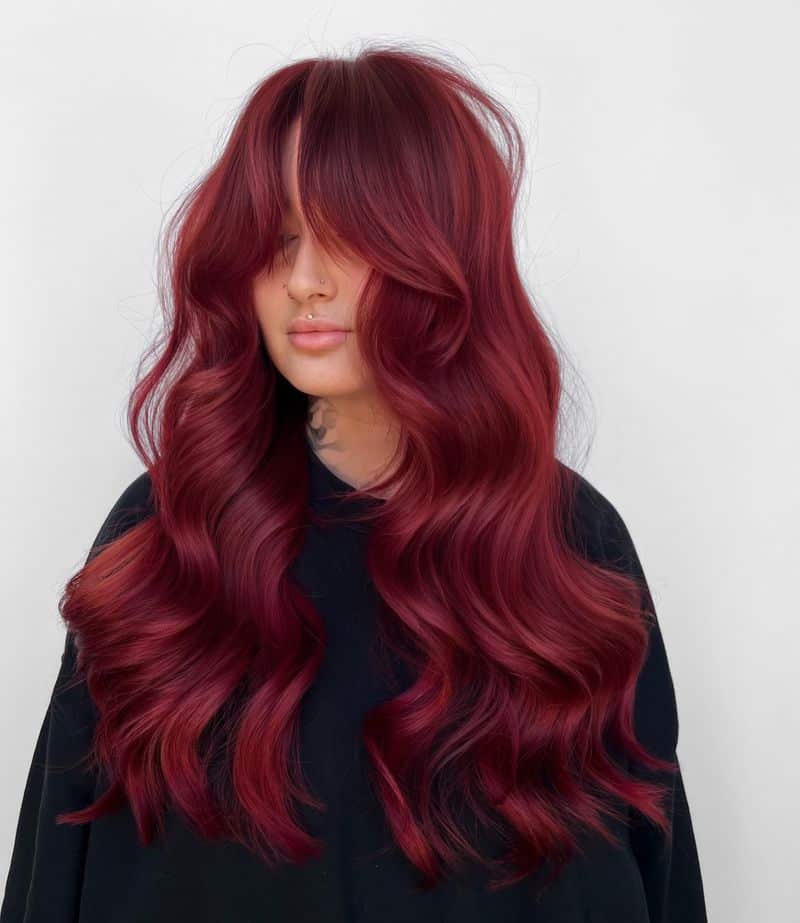 5. Berry Crimson Curtain Bangs