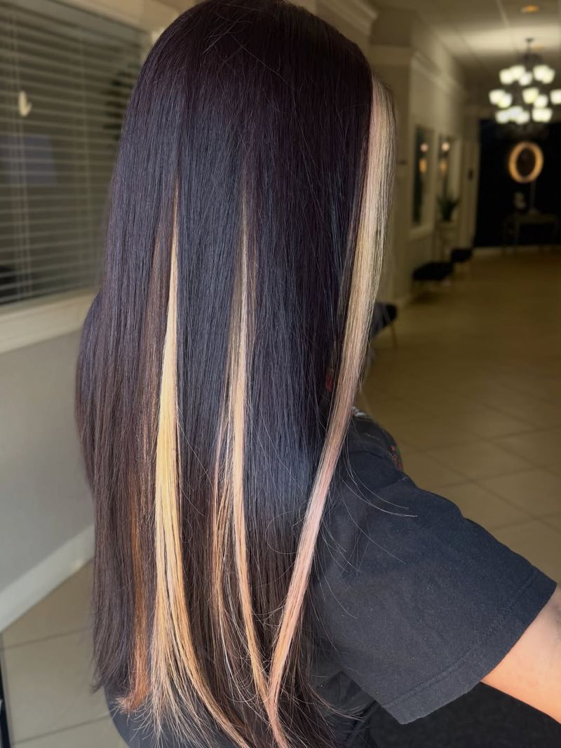 53. Black Hair with Blonde and Pink Highlights