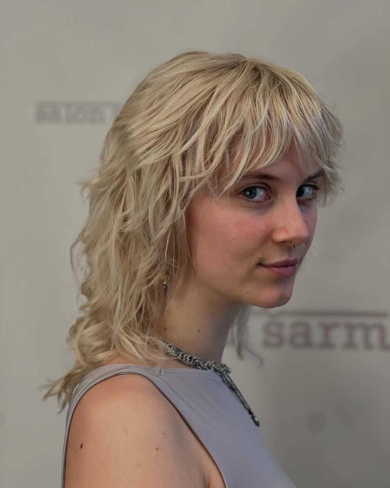 26. Bleach Blonde Shag with Feathered Fringe