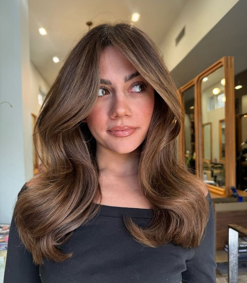 42. Blowout Layers with Curtain Bangs