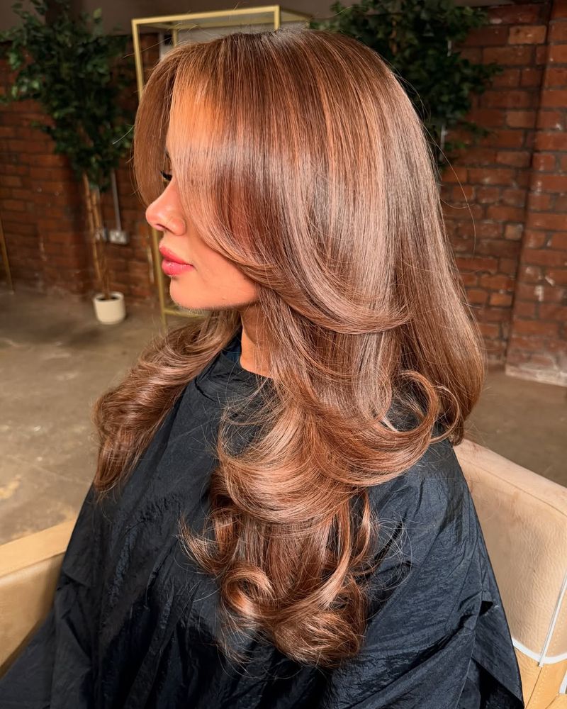 32. Blowout Layers with Curtain Bangs