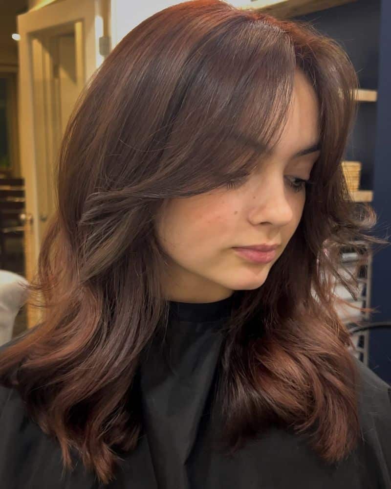 25. Blowout Layers with Soft Burgundy Tint