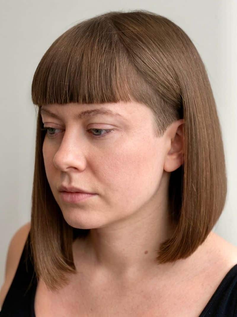 8. Blunt Bangs with Undercut Detail