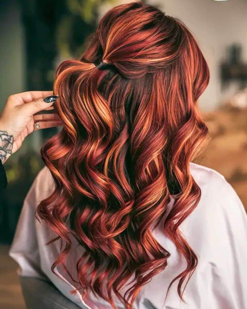 26. Bright Amber Balayage Half-Up Waves