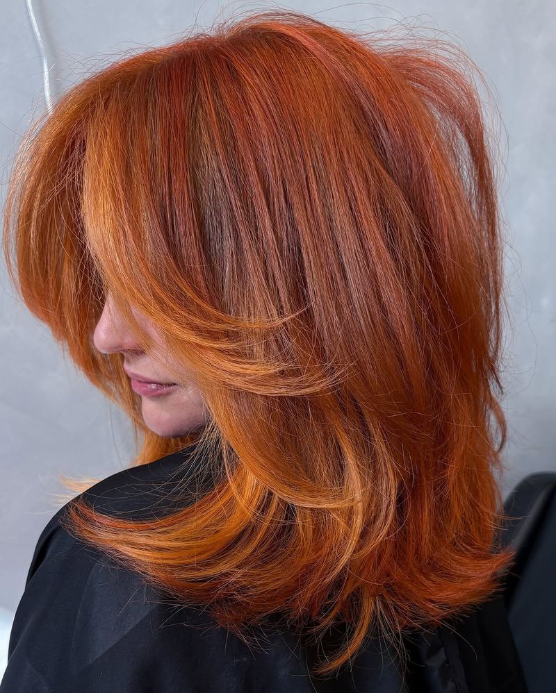 53. Bright Copper Layers with Curtain Bangs