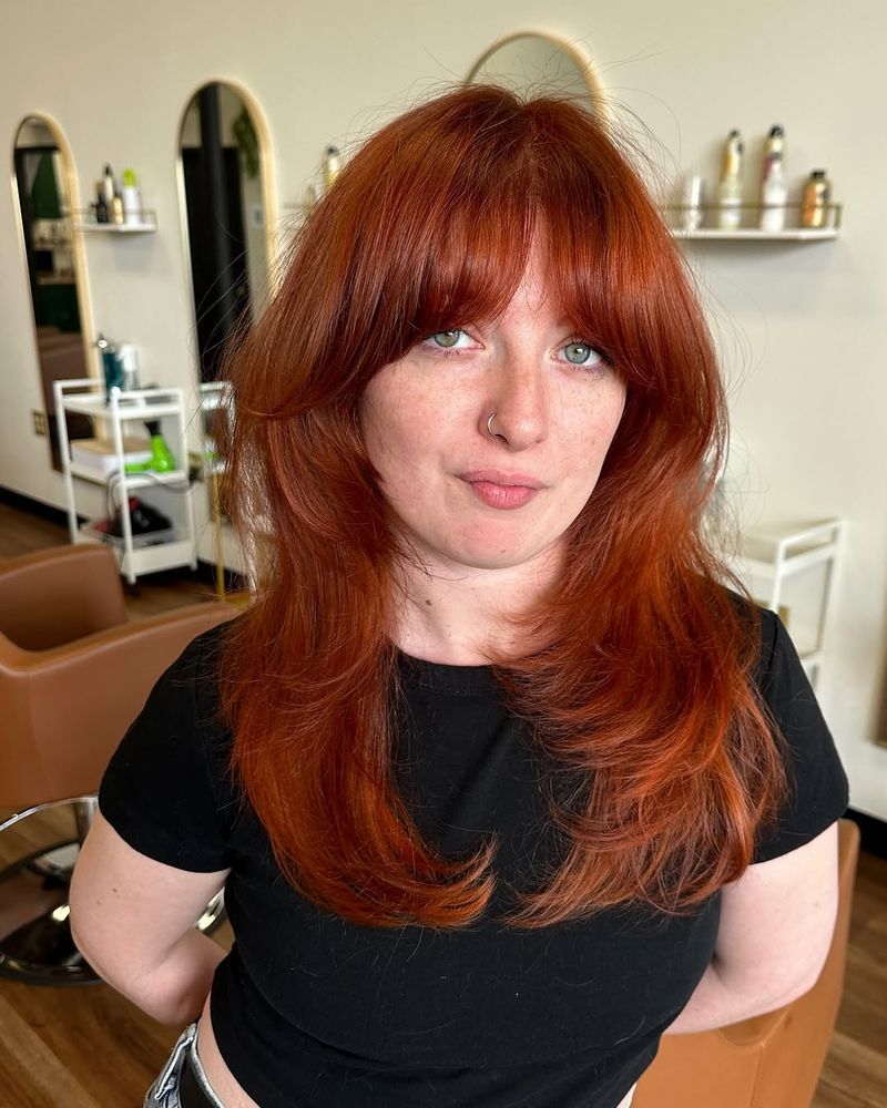 41. Bright Copper Shag with Curtain Bangs