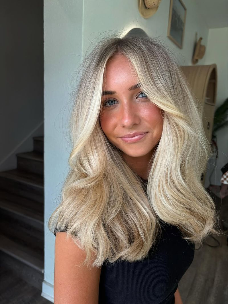 41. Bright Vanilla Blonde with Curtain Bangs