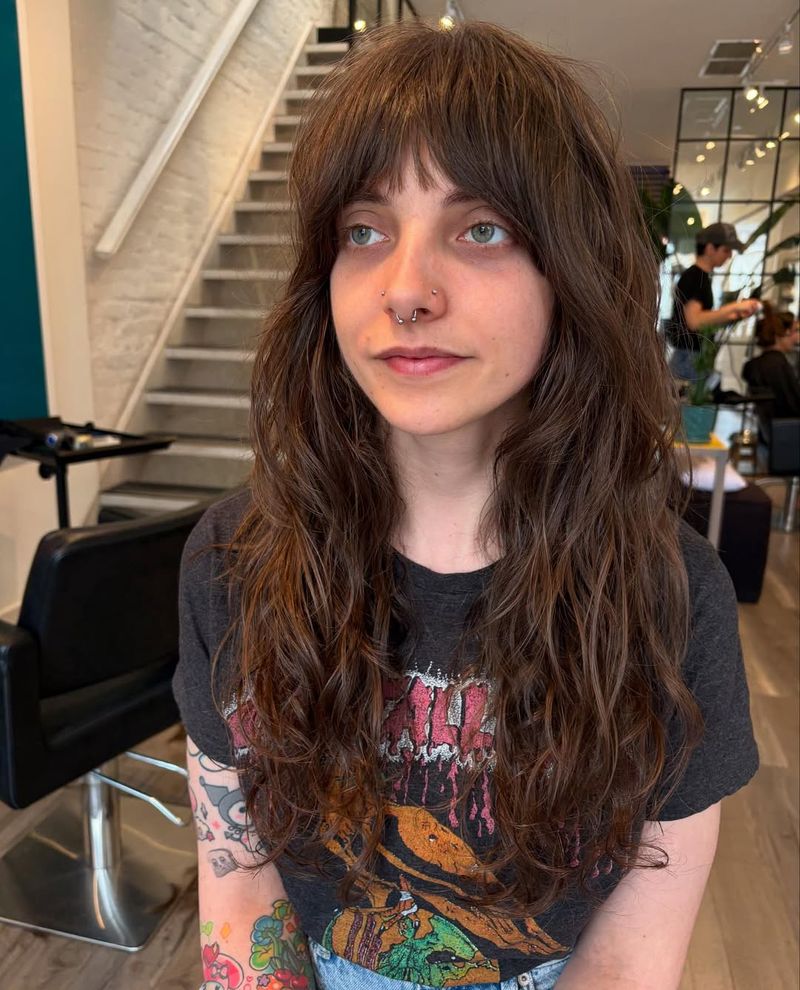 32. Brunette Shag with Full Bangs