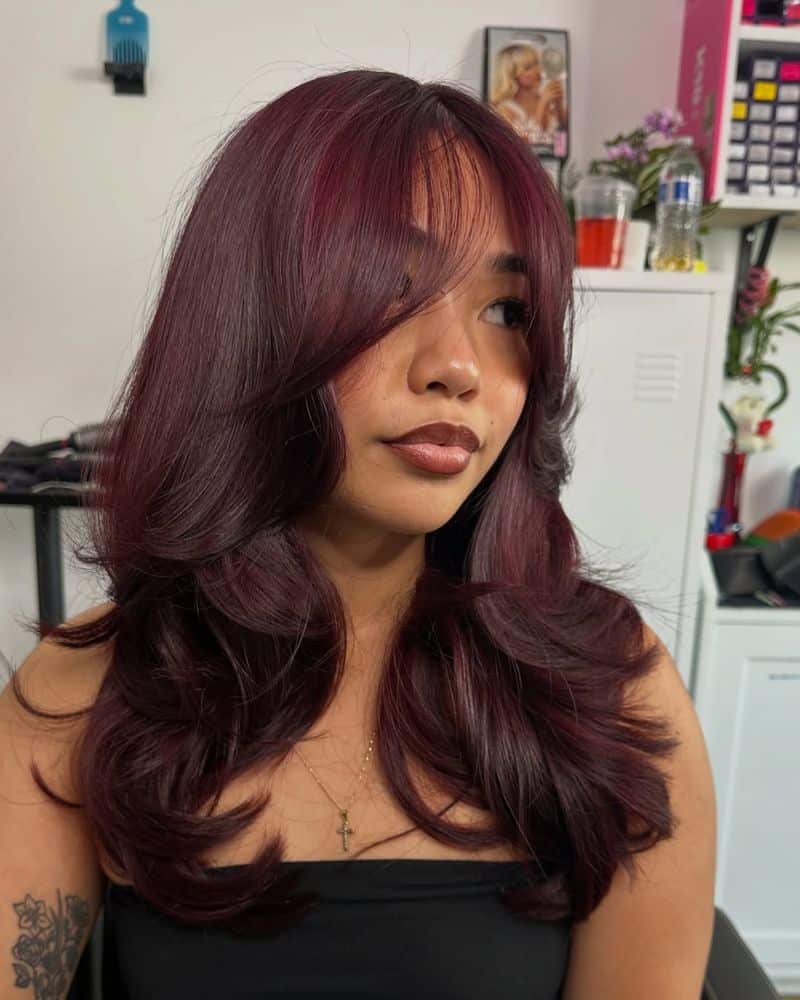 26. Burgundy Butterfly Layers with Wispy Bangs