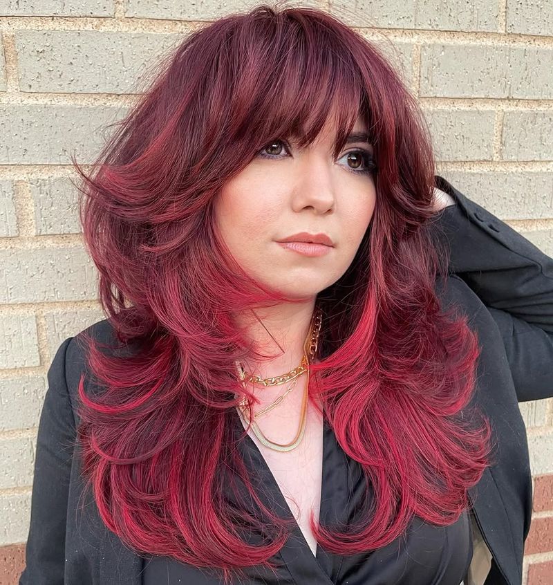 43. Burgundy Layered Shag with Heavy Bangs