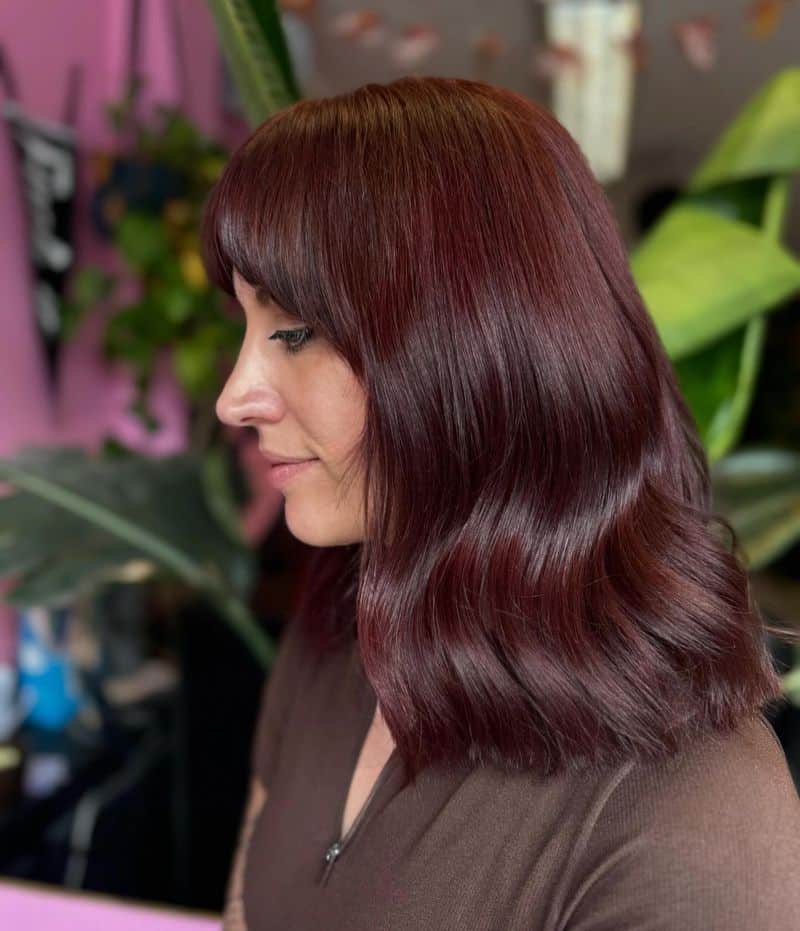 26. Burgundy Waves with Straight Bangs