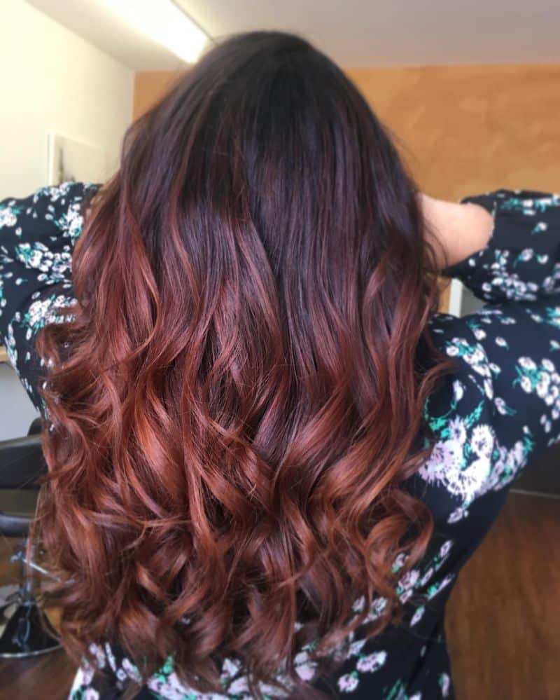 33. Burgundy-to-Copper Balayage Curls