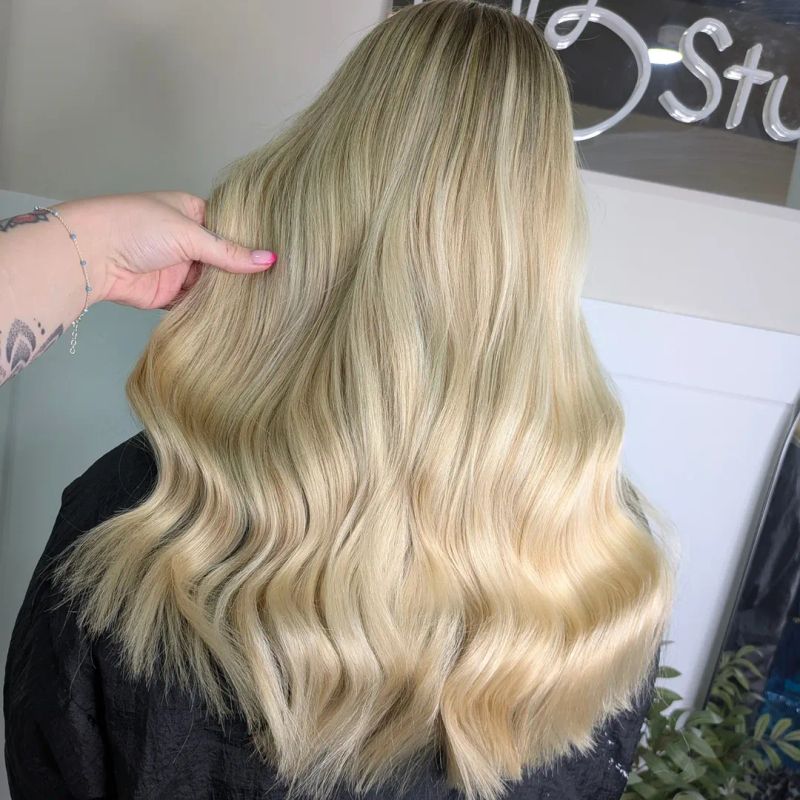 9. Buttercream Waves with Smudged Roots