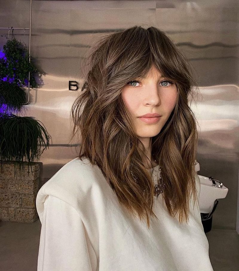 48. Caramel Brown Shag with Curtain Bangs