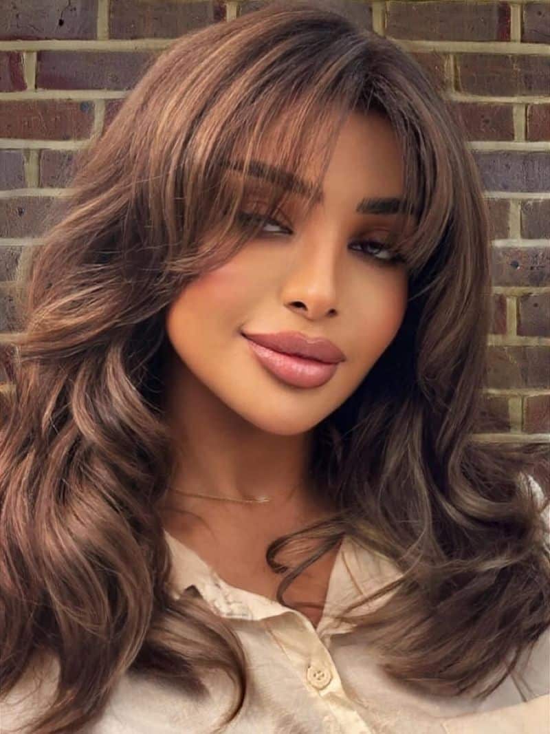 33. Caramel Highlighted Waves with Soft Fringe