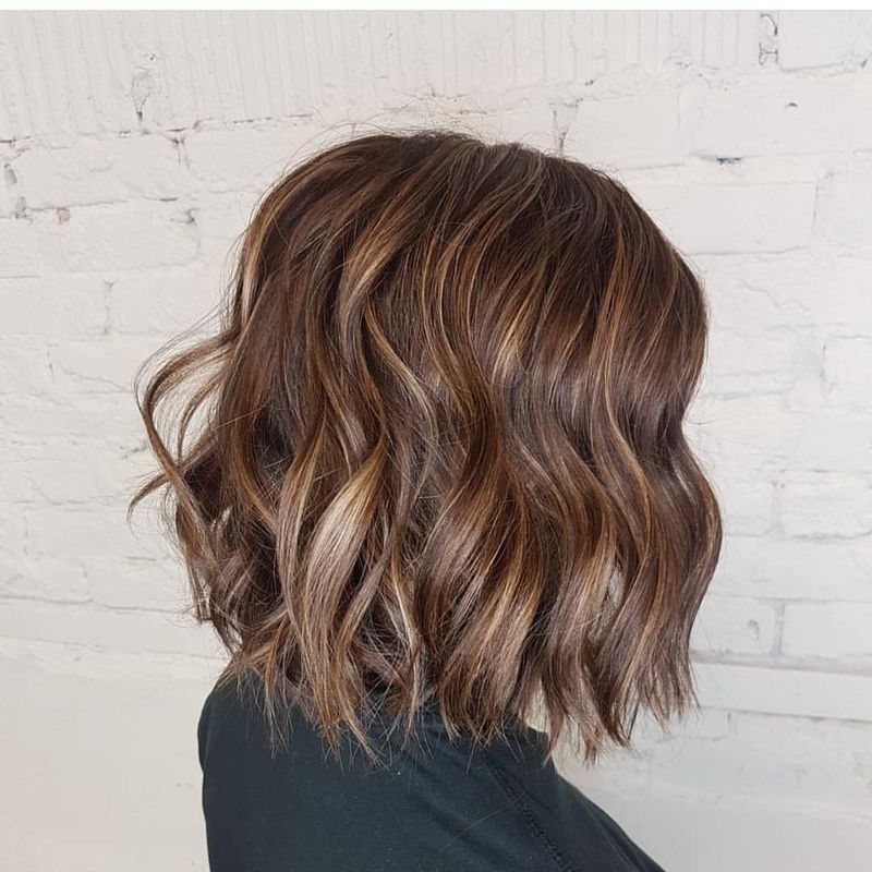4. Caramel Highlighted Wavy Lob