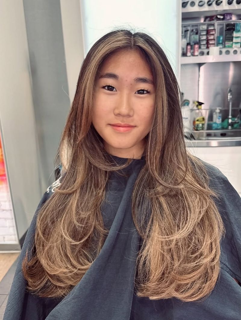 32. Caramel Highlights with Long Curtain Layers
