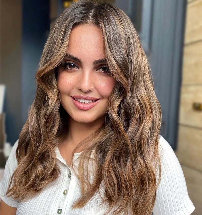 32. Caramel Highlights with Soft Waves