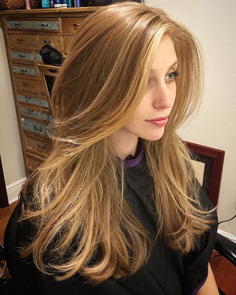 9. Caramel Honey Layers with Sweeping Side Bangs