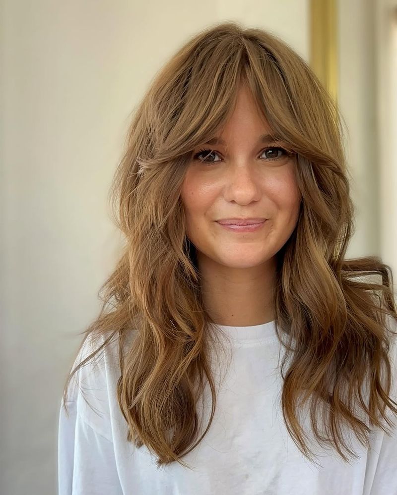 60. Caramel Layered Shag with Full Curtain Bangs