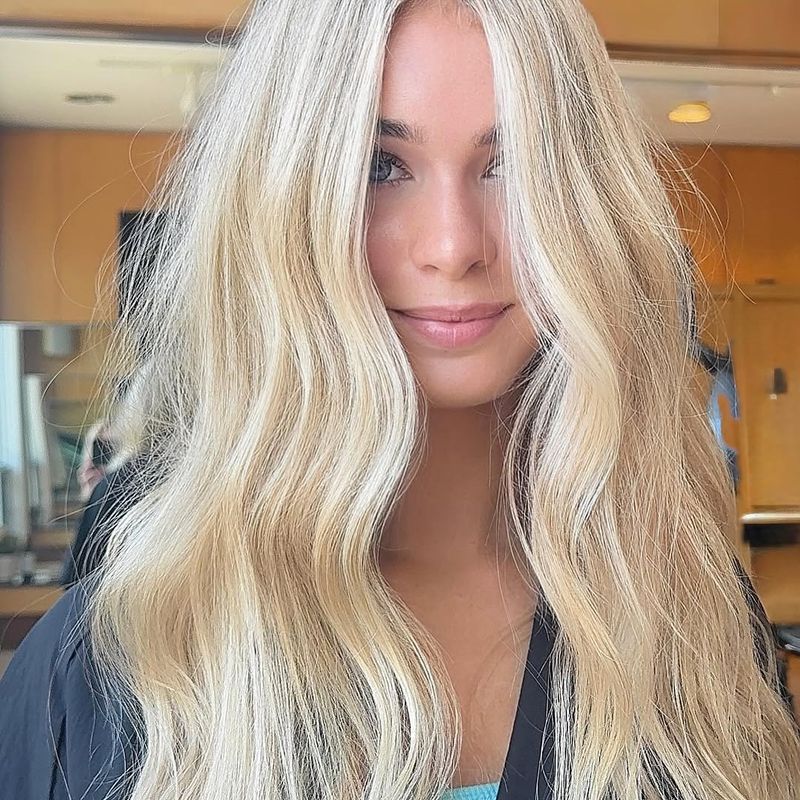 22. Center Part Creamy Blonde Waves