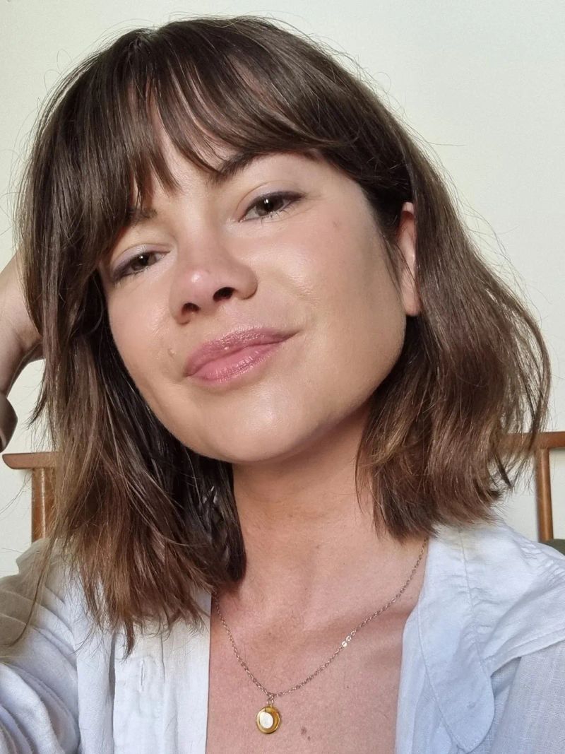 12. Chestnut Bob with Soft Bangs
