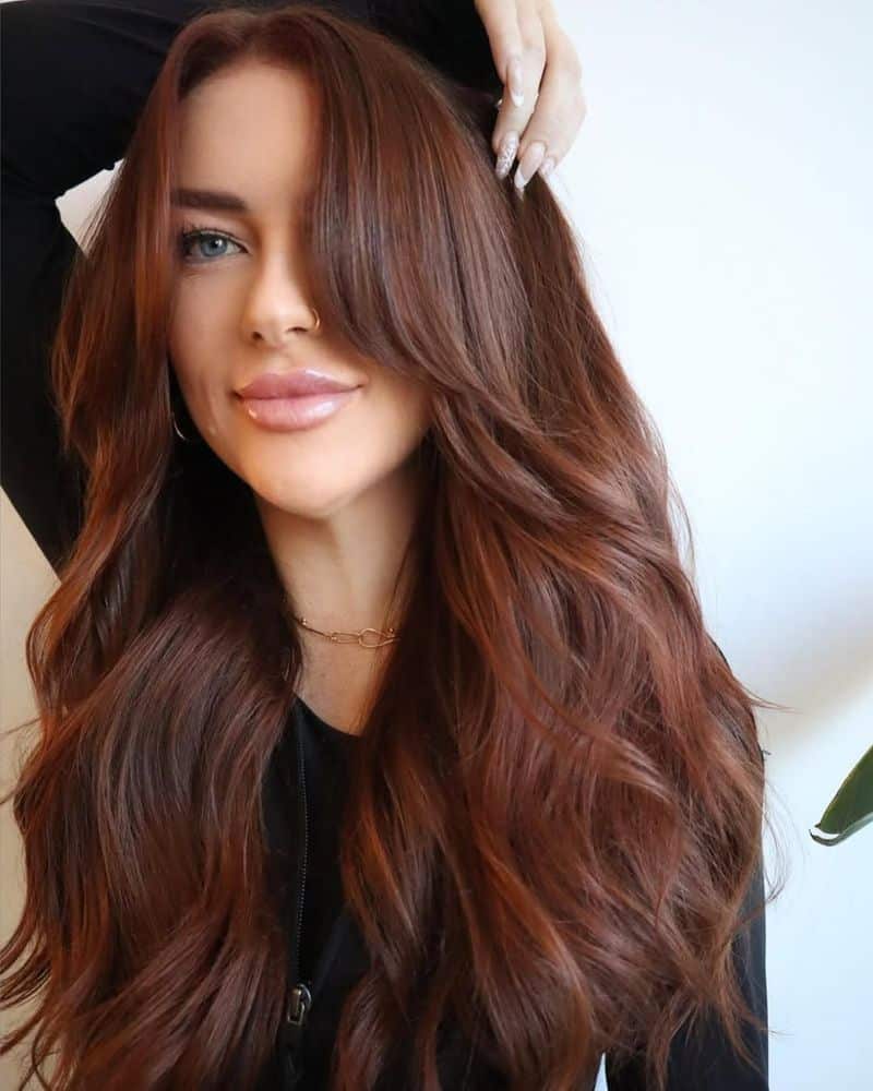 6. Chestnut Depth with Soft Curtain Bangs
