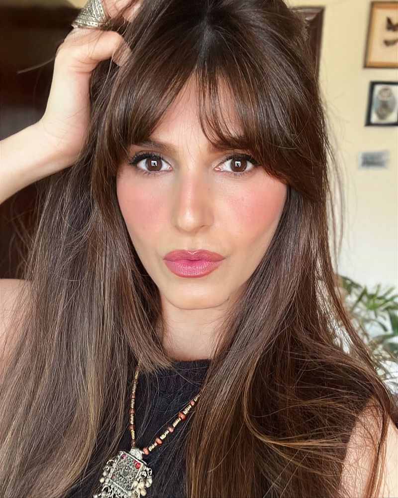 10. Chestnut Layers with Full Eyebrow-Grazing Fringe