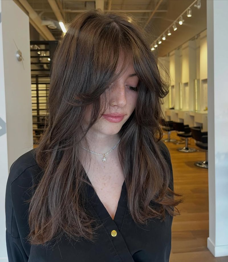 7. Chocolate Brown Blowout with Feathered Bangs