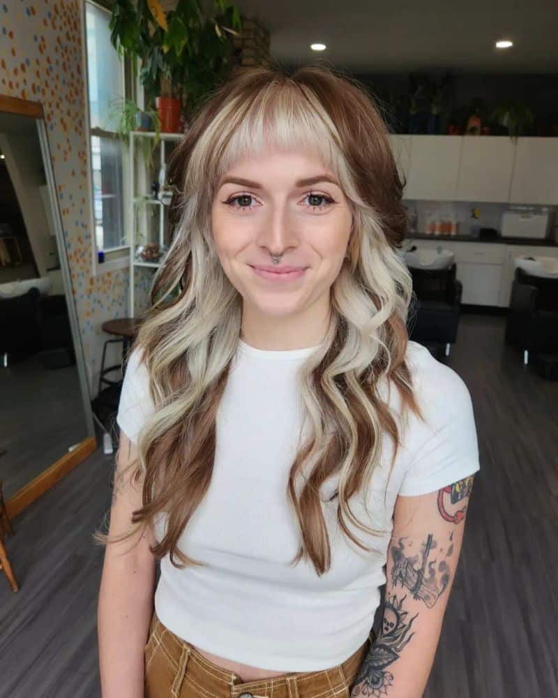 17. Chunky Bangs and Bright Blonde Money Pieces