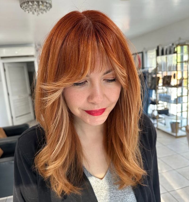 48. Copper Curtain Bangs with Bright Blonde Money Pieces