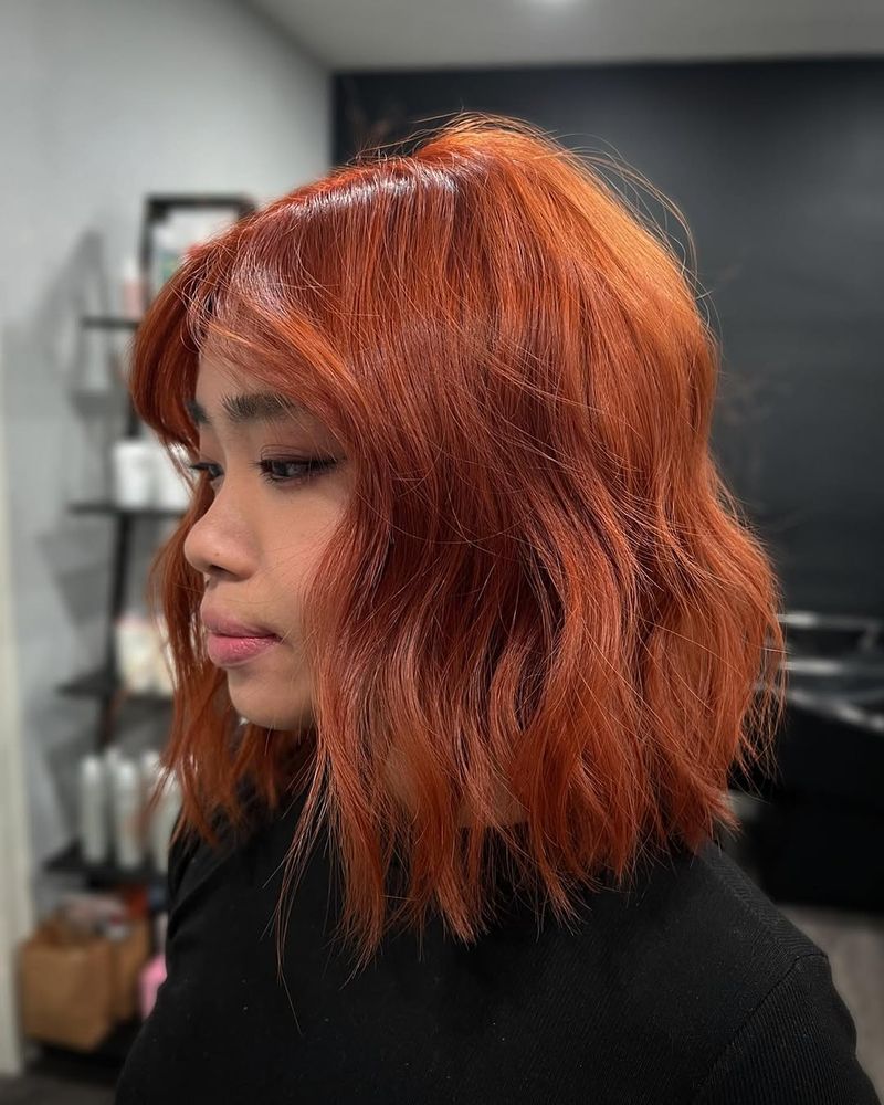 26. Copper Waves with Soft Curtain Bangs