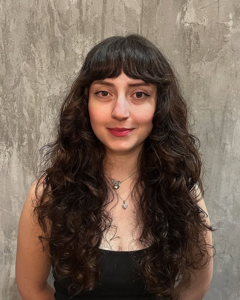 48. Curly Shag with Heavy Micro Bangs