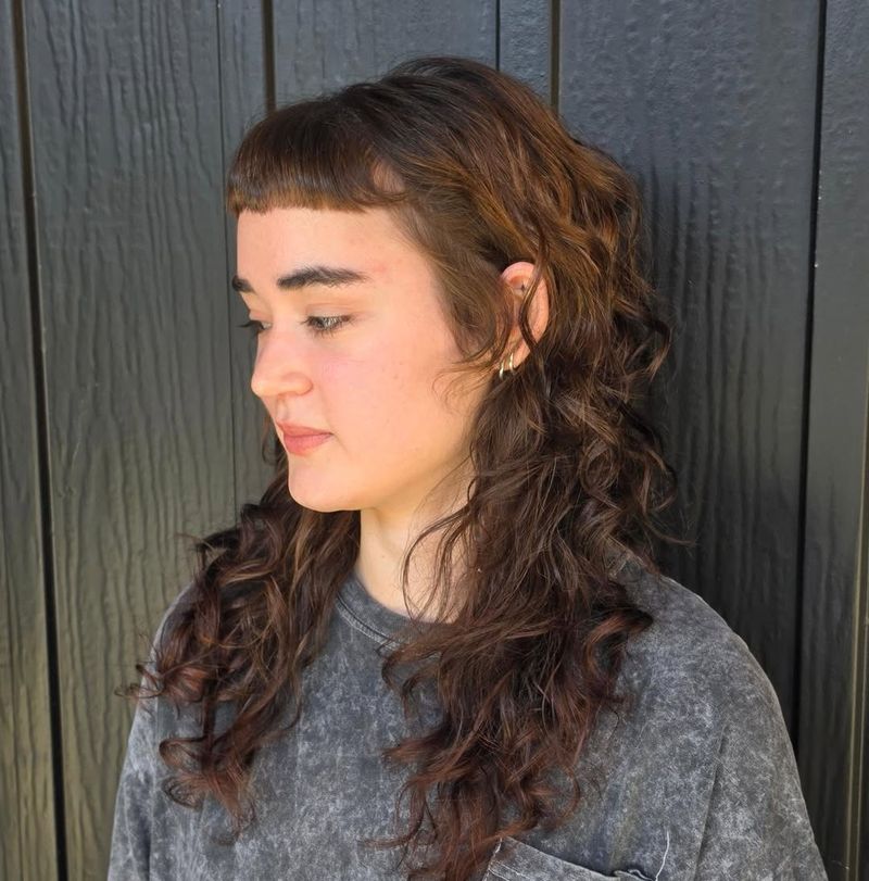 30. Curly Shag with Micro Fringe