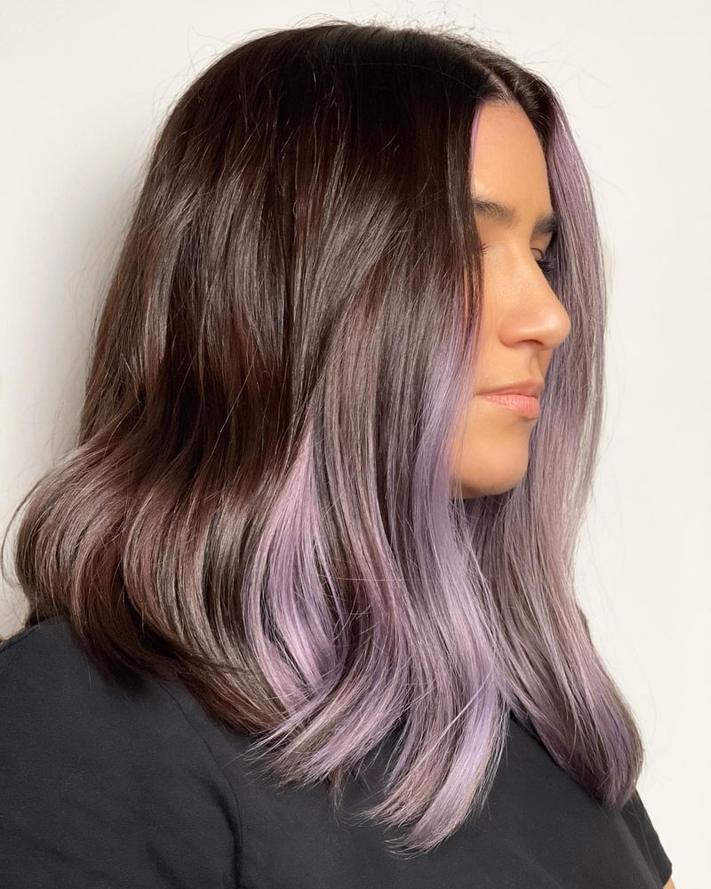 14. Dark Brunette with Lilac Face-Framing Highlights