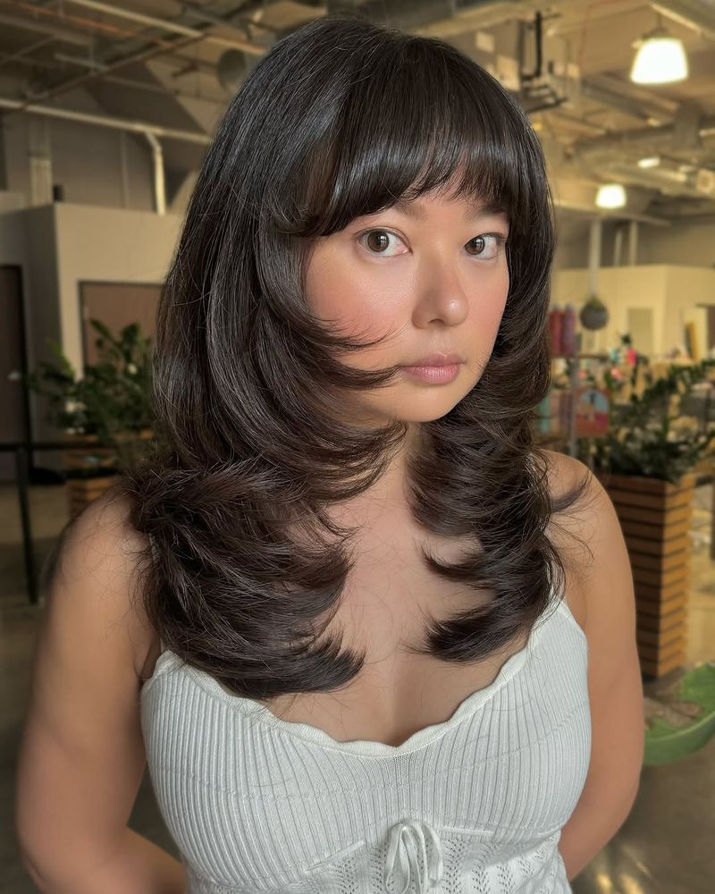 12. Dark Espresso Feathered Layers with Curved Bangs