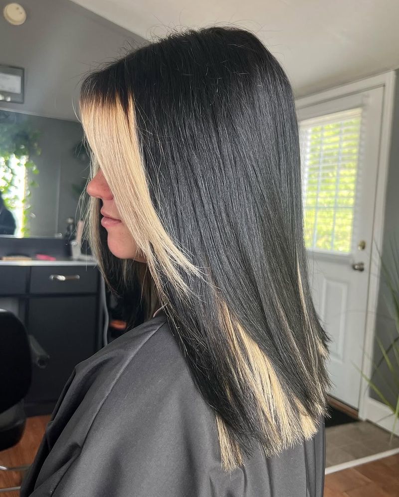 38. Dark Strands with Front Blonde Streaks