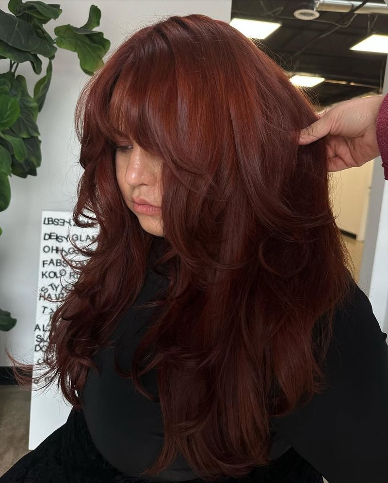 17. Deep Auburn Layers with Full Bangs