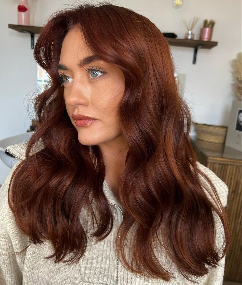 16. Deep Auburn Waves with Curtain Bangs