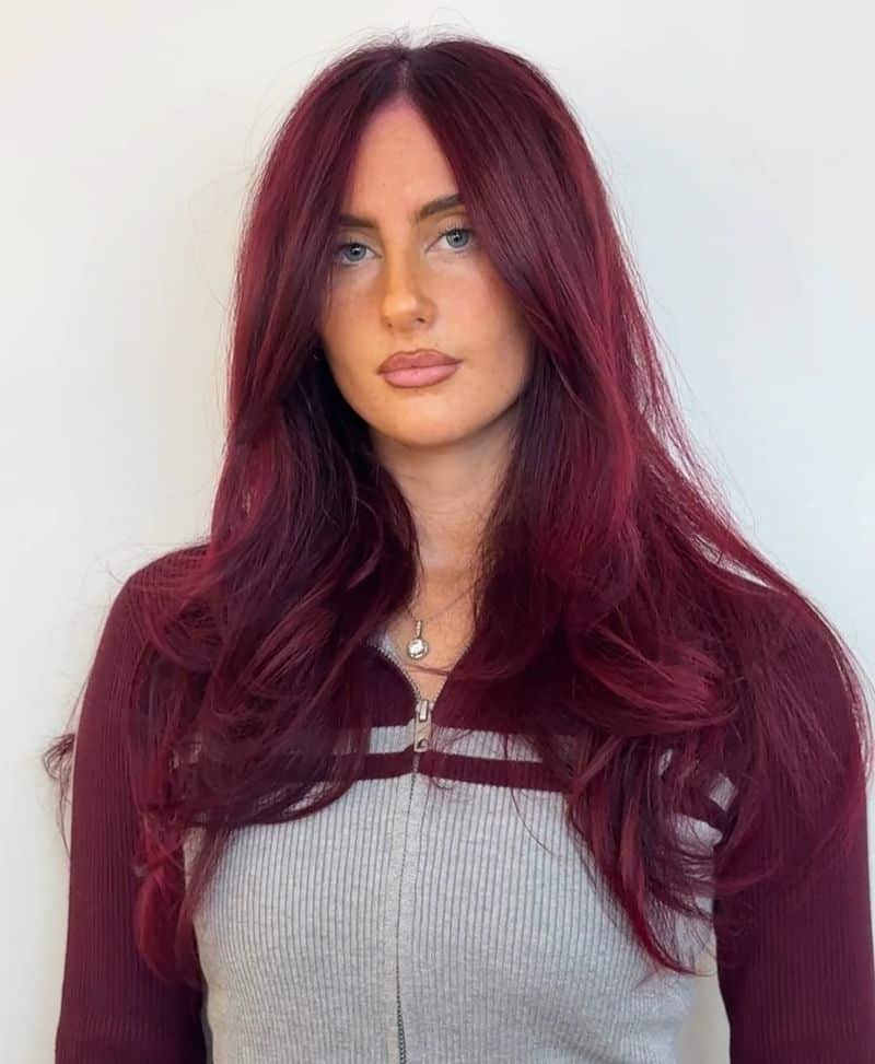 39. Deep Burgundy Curtain Bangs