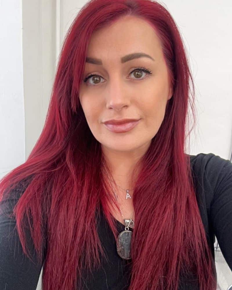 20. Deep Burgundy with Side-Swept Bangs