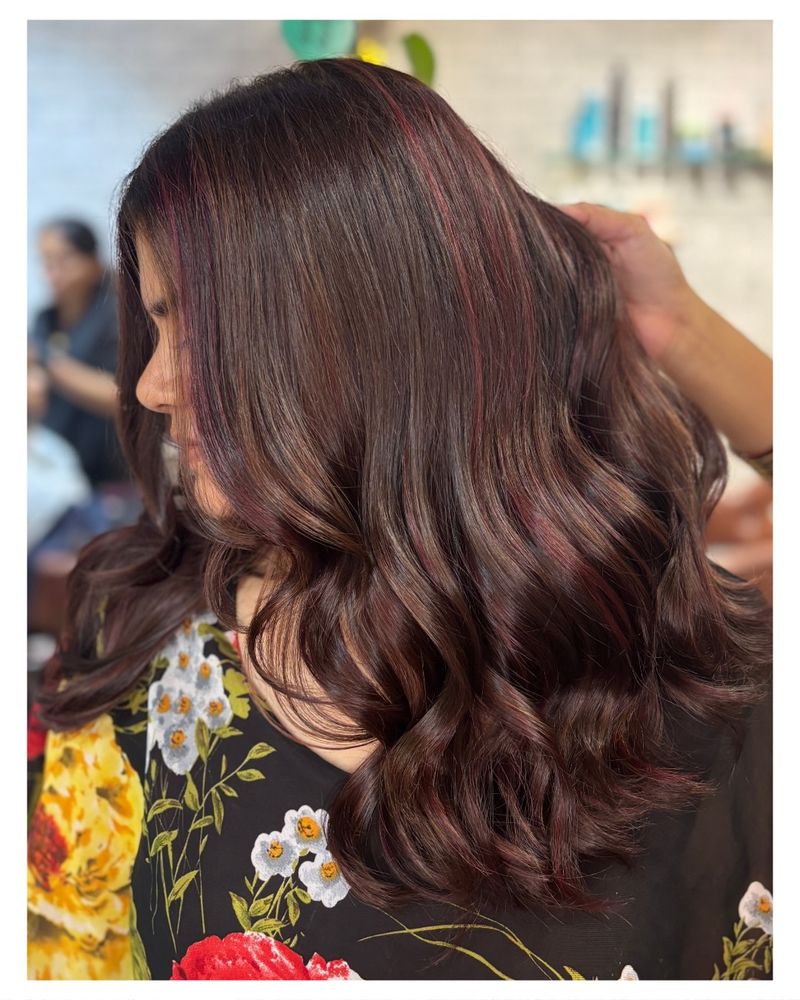39. Deep Chestnut Waves with Subtle Burgundy Streaks