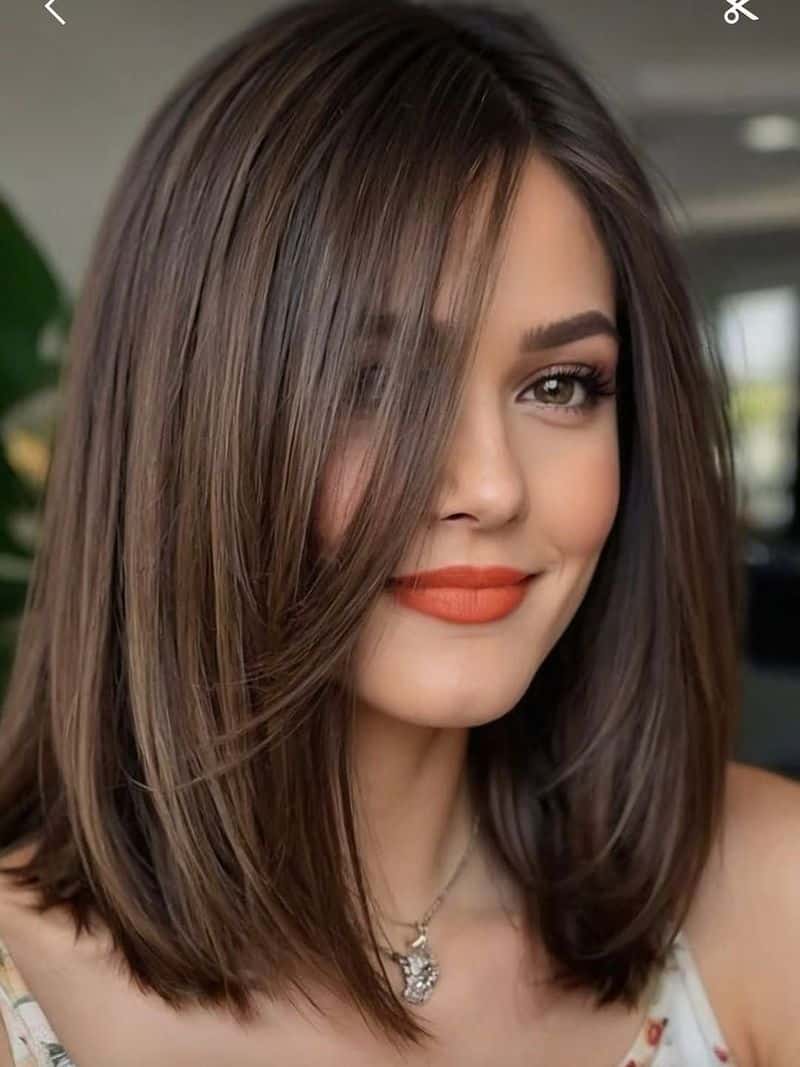3. Deep Espresso Side-Swept Bob