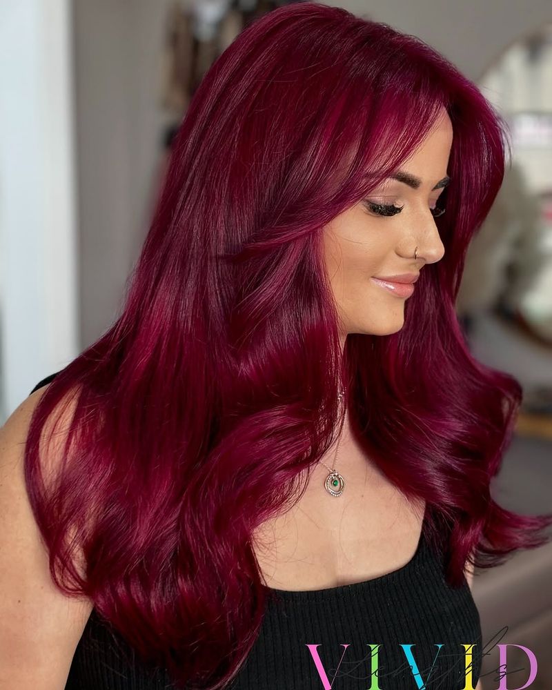 19. Deep Magenta Waves with Curtain Bangs
